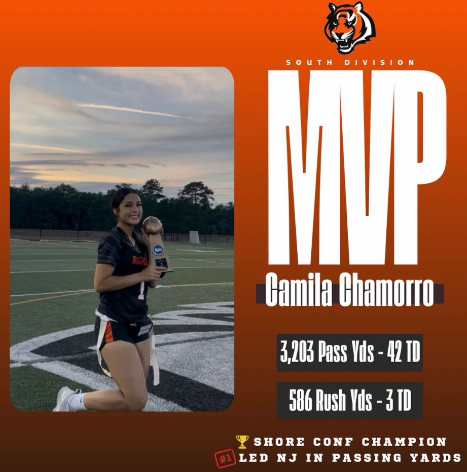 Image of Camila holding the Conference trophy that states MVP, her name, 3,203 passing yards for 42 TD's, 586 rushing yards for 3 TD's, an d led NJ in passing yards.