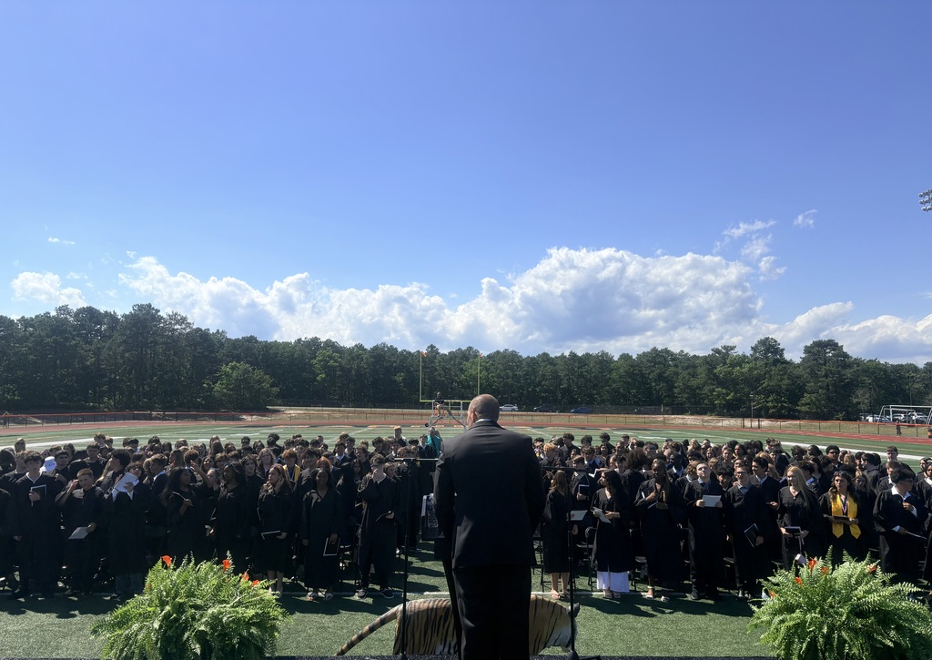 Image of the ROBMS class on the field during the Promotion Ceremony being addressed by the Principal.