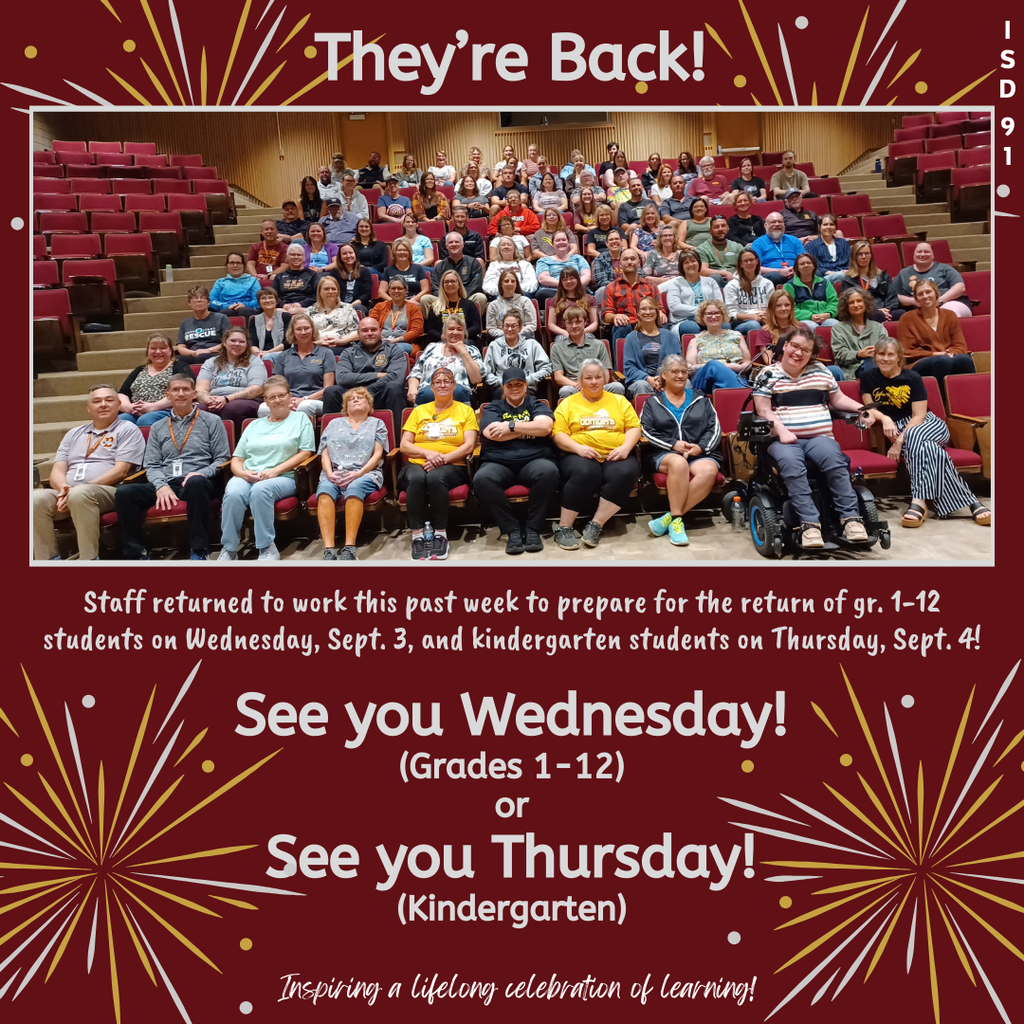 All staff photo in auditorium seats