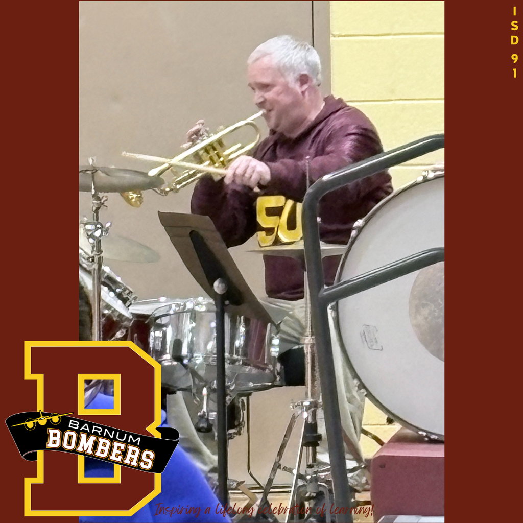 Band Director playing the drum set and trumpet at the same time