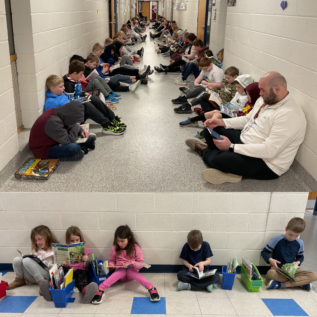 BES student reading train throughout hallway