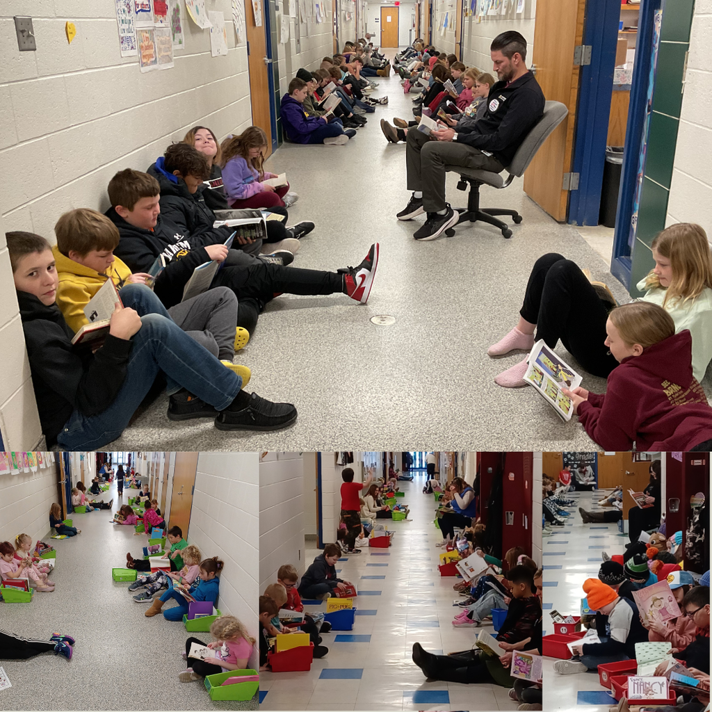 BES student reading train in hallways