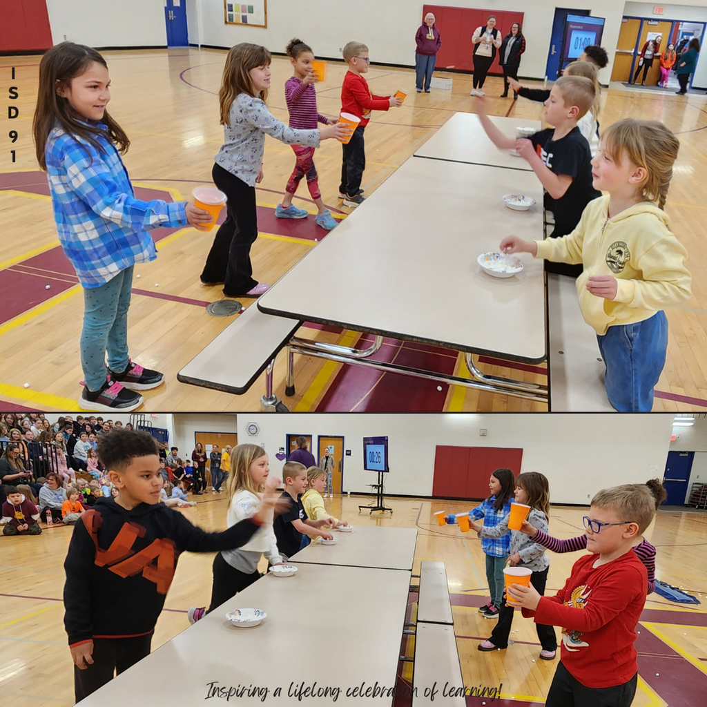 BES students in gym throwing marshmallows into cups