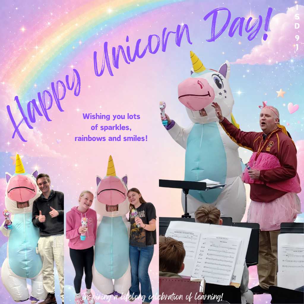 Unicorn posing with staff and students