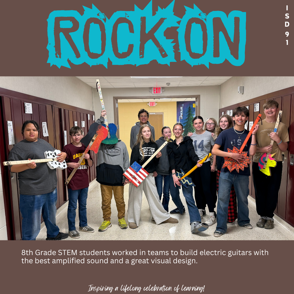 8th graders pose in the school hallway with your uniquely designed, home-made electric guitars.