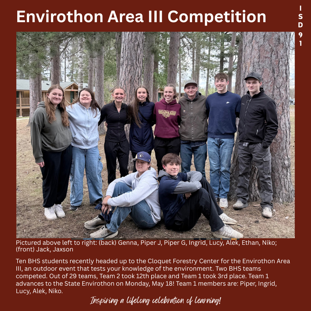 10 BHS students posing in a group outside amongst mature pine trees