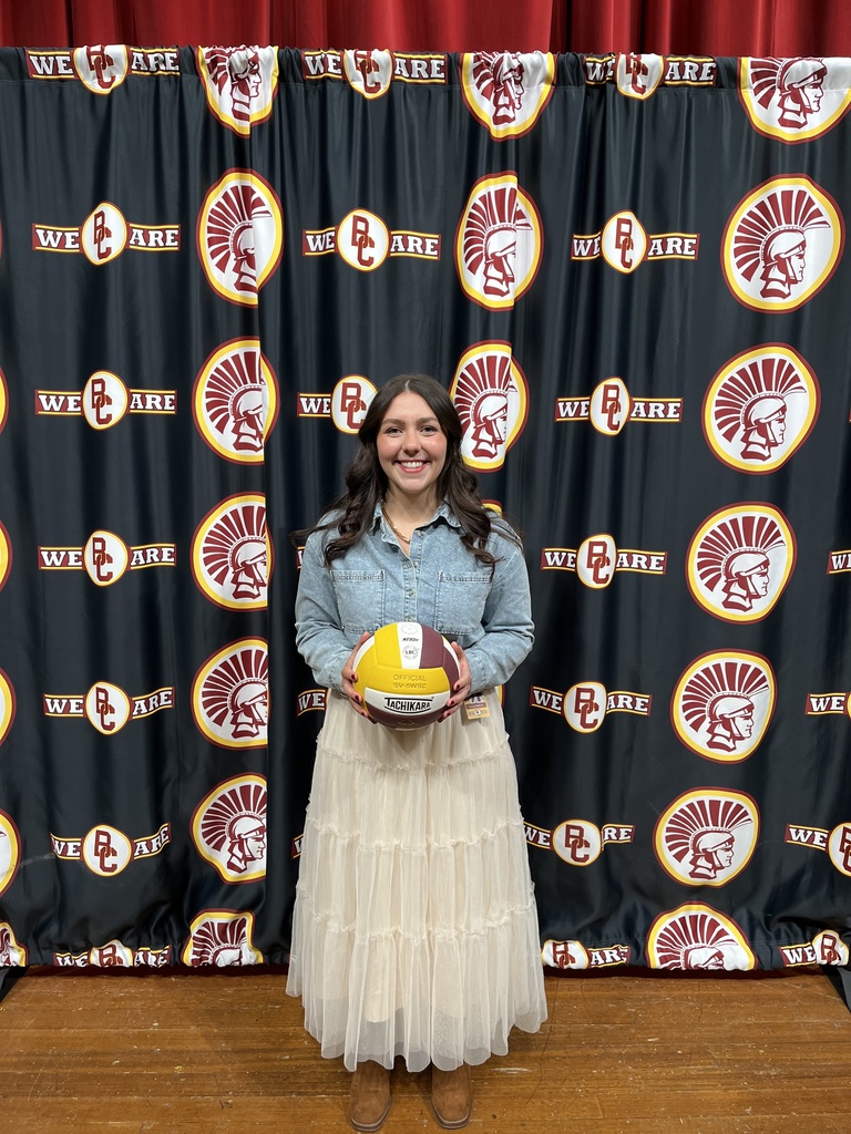 Stephens holding volleyball