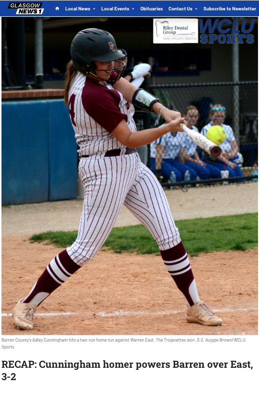 Barren County's Adley Cunningham hits a two-run home run against Warren East. The Trojanettes won ,3-2. Auggie Brown/WCLU Sports