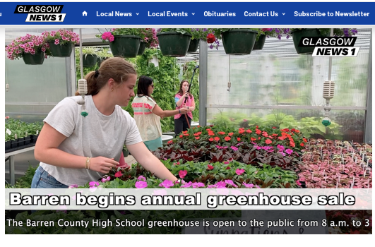 Students working in greenhouse