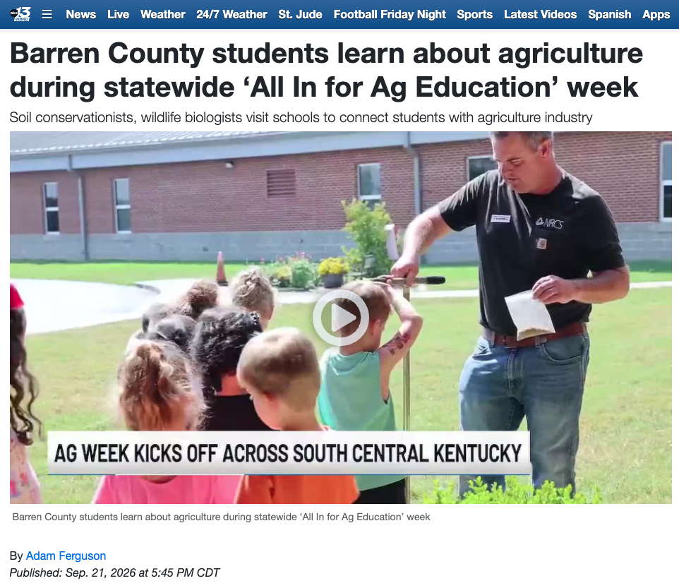 Students watching soil demonstration