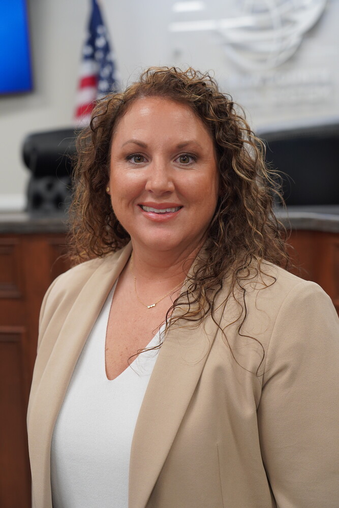 woman in white and beige suit