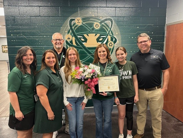 Natalie Crosby, AHS Teacher of the year with her family and admin staff