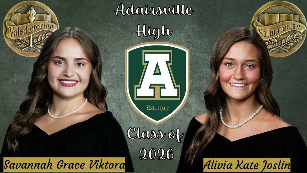 a photo fo the valedictorian and salutatorian from AHS.  Green background and school crest