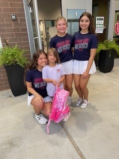 Woodland cheerleaders smiling for a picture