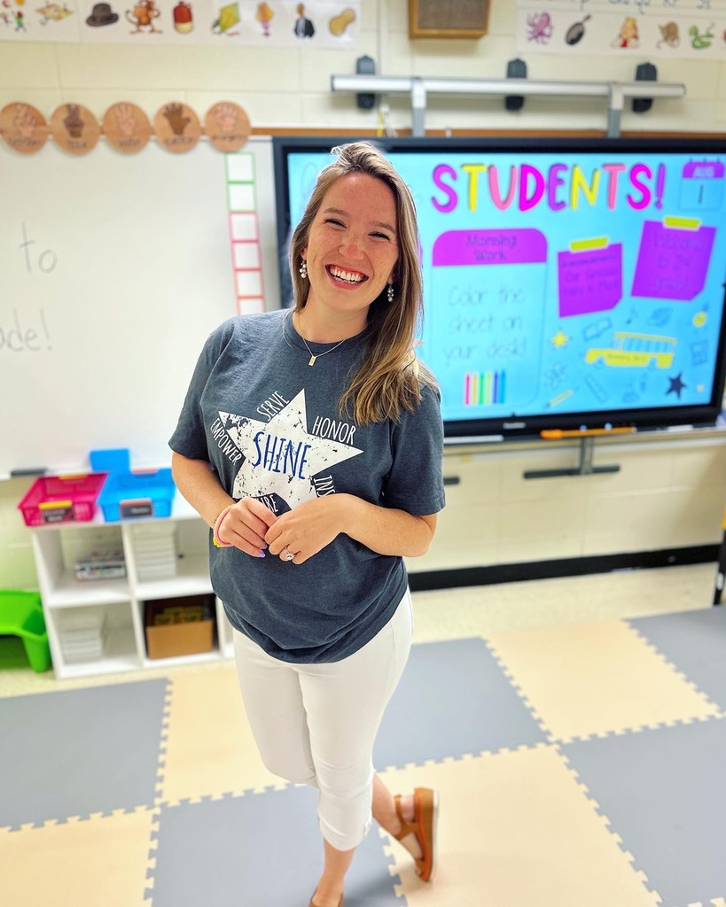 Emily Kobito standing in her classroom