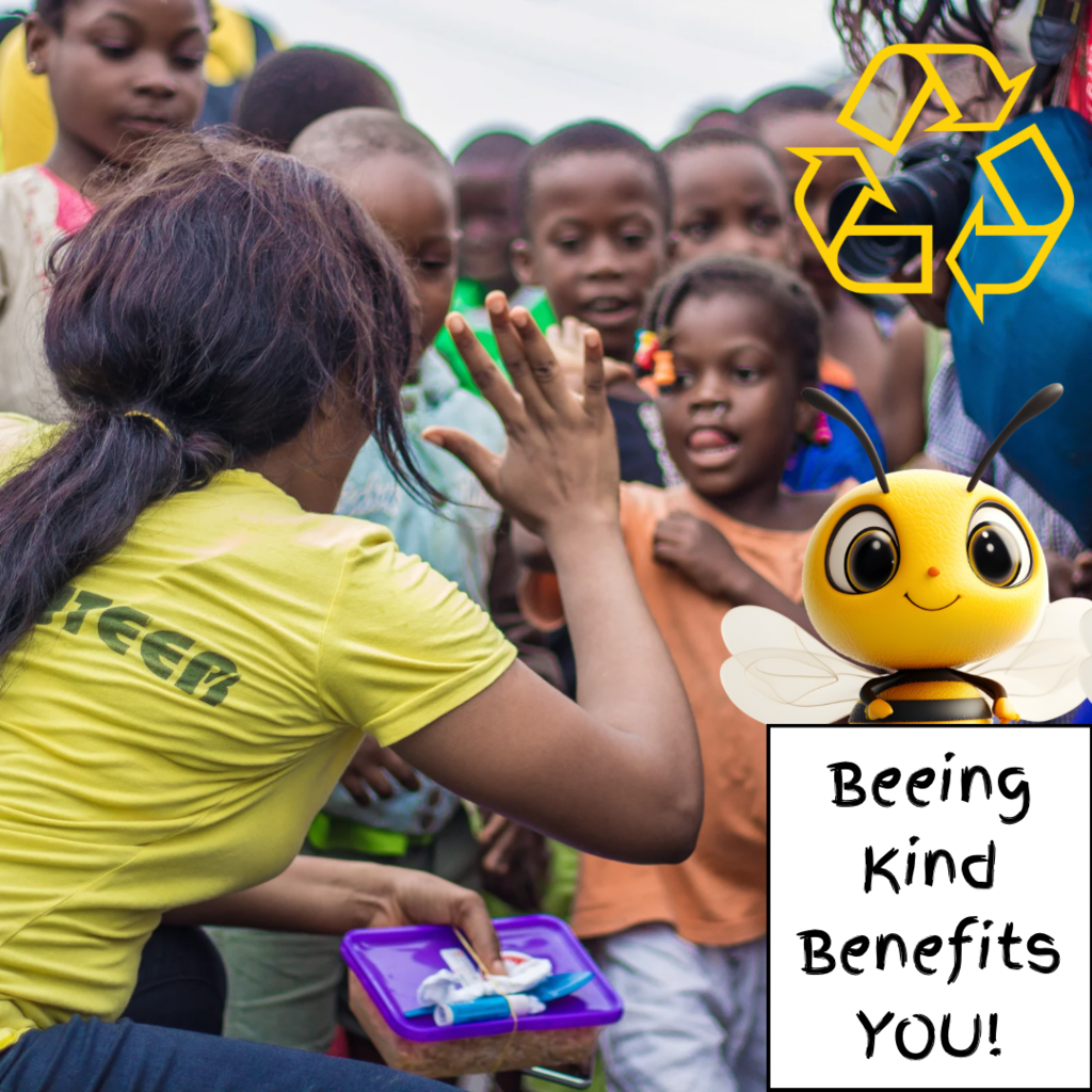 girl with black hair and yellow shirt giving high five to a girl with braids and an orange shirt on. A Cartoon bee in the lower right side of the picture above a sign that says "Beeing kind benefits you"