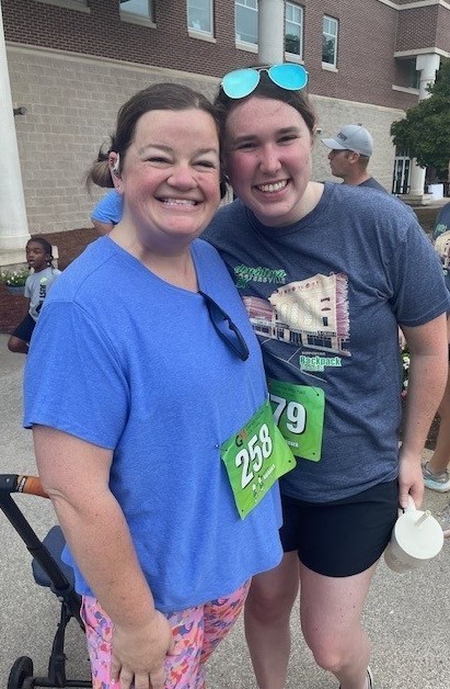 Two first grade teachers smiling for a picture at the 5k