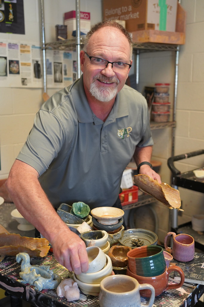 Jamey Laney with pottery