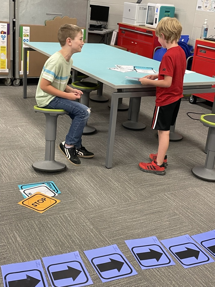 Our first ever coding club meeting with Ms. Munch. They had a great time learning about coding, and they even played coding hopscotch.