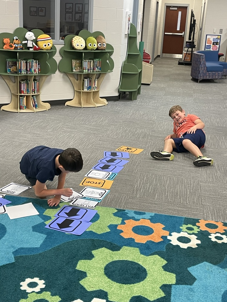 Our first ever coding club meeting with Ms. Munch. They had a great time learning about coding, and they even played coding hopscotch.
