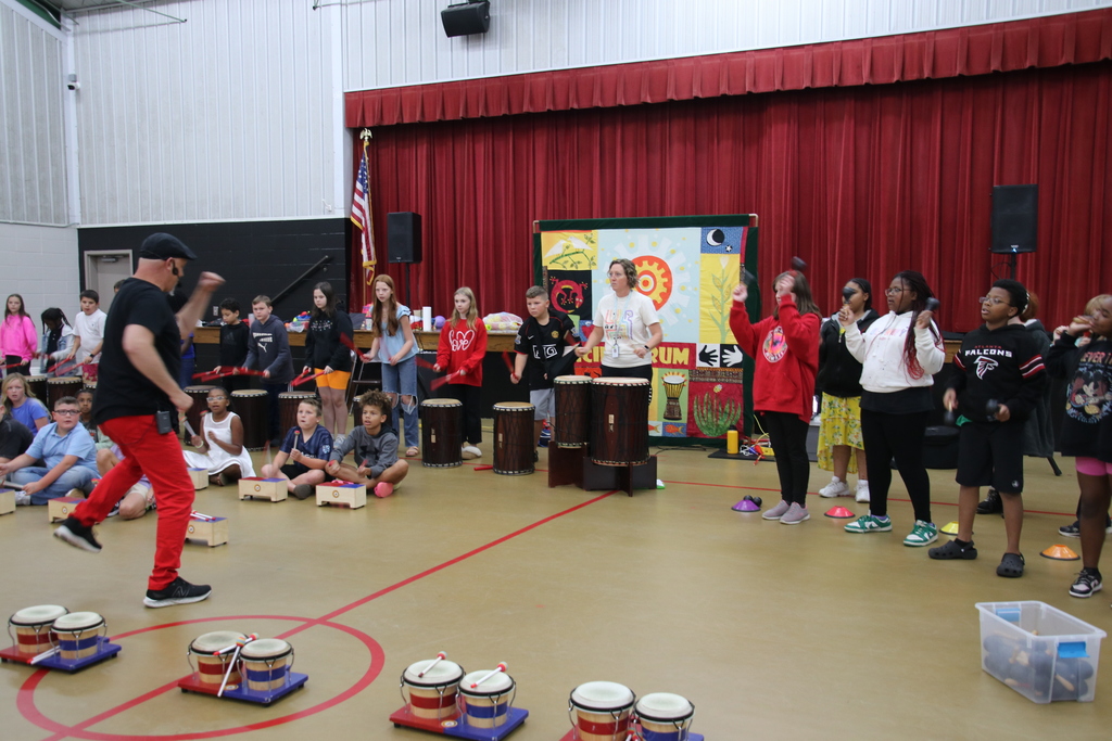 Drumming Up Character!    This past Tuesday, our students enjoyed School Drum Day!  Mr. Steve at Dancing Drum led our students through rhythms and songs about fairness, responsibility, teamwork, and caring for others.    It was truly a "drum"-atic event with fun had by all!  To contribute to the Dancing Drum Program and support future musical events at our school, please visit the School Window payment platform our website and scroll within the MUSIC/CHORUS category.