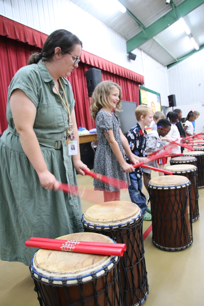 Drumming Up Character!    This past Tuesday, our students enjoyed School Drum Day!  Mr. Steve at Dancing Drum led our students through rhythms and songs about fairness, responsibility, teamwork, and caring for others.    It was truly a "drum"-atic event with fun had by all!  To contribute to the Dancing Drum Program and support future musical events at our school, please visit the School Window payment platform our website and scroll within the MUSIC/CHORUS category.