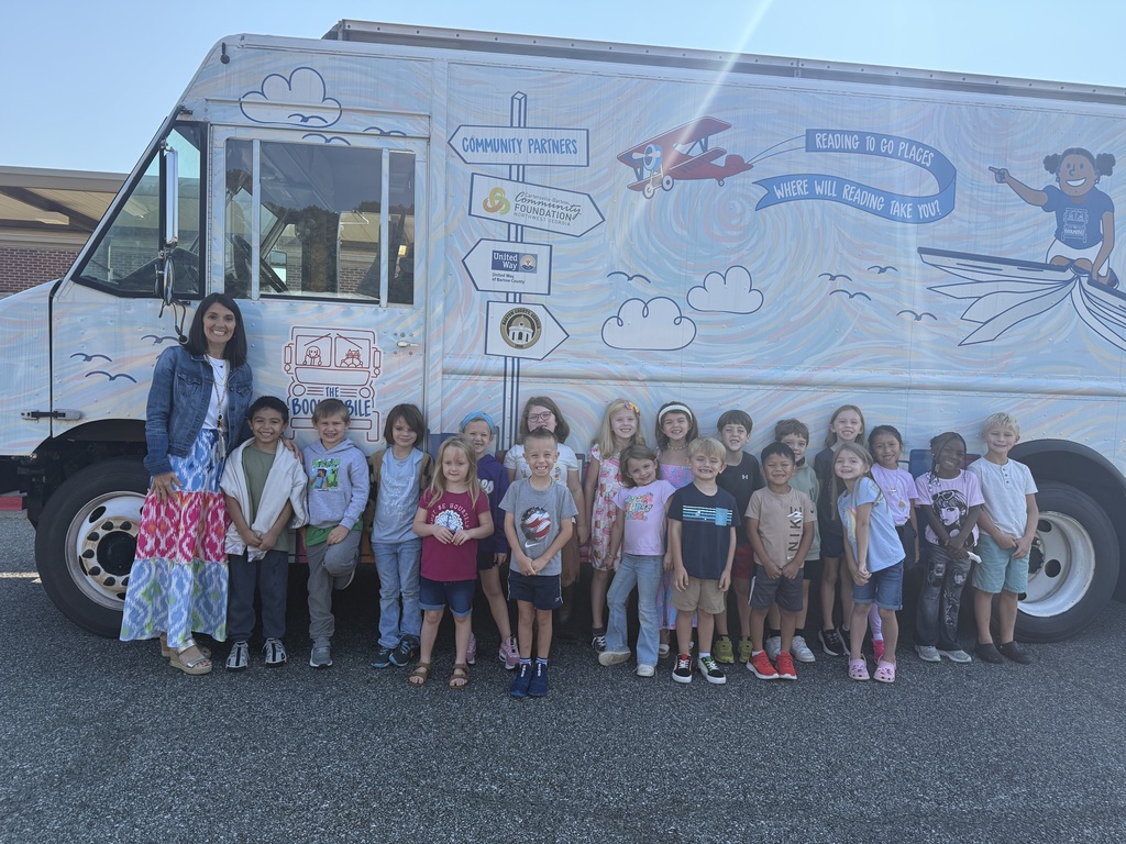 classroom of students in front of the book mobile
