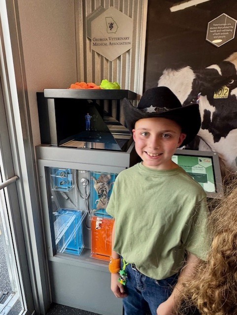 Our 3–5 students had an exciting visit from Georgia Farm Bureau and their mobile Georgia Ag Experience!  This 36-foot mobile classroom showcases Georgia agriculture on the road, visiting elementary schools and community organizations across the state. Inside, students explored seven different Georgia agricultural commodities through technology and digital learning.   The Georgia Ag Experience is a STEM-based program that invites students across Georgia to discover the vast opportunities in agriculture. It connects science, technology, and real-world farming in a way that brings learning to life for our students and helps them think about possible future careers in the agricultural field, from farming and animal science to technology and engineering.   A special shoutout to Gaines Beef for joining us with the Ag Mobile. They also partner with our School Nutrition team to provide fresh beef to our schools, and we are so grateful for their support.