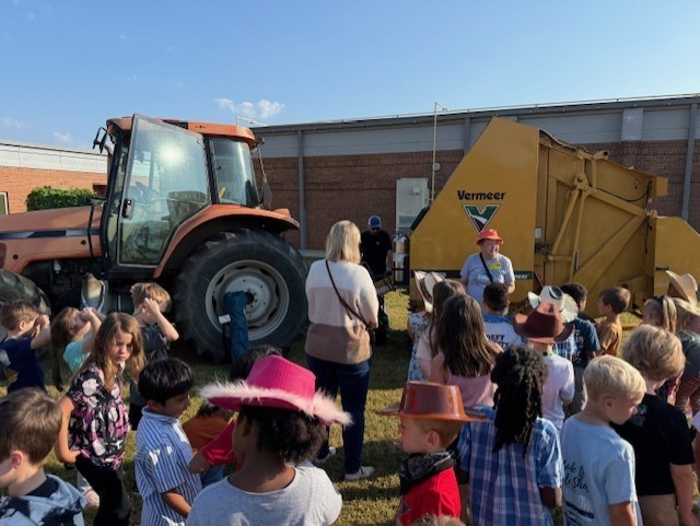 Thursday was full of Farm Fun for our K-2 graders!  All our littles got to experience life on a farm as they traveled around the school grounds visiting Georgia agricultural animals, thanks to our amazing local community partners who brought their own animals and equipment to our campus for us all to enjoy!  A big thank you to: Kevin and baby Blakeley from K&T Farms The Bagwell family Pettit Creek Farms The Joslin family Georgia Farm Bureau Bartow County Master Gardeners  Learning about agriculture and animals is important for our elementary students because it helps them understand where their food comes from, the hard work of local farmers, and the role agriculture plays in Georgia’s economy and community. It connects classroom learning to real-world experiences and inspires appreciation for the people who help feed us every day.  We enjoyed having a special guest, Sharon Viktora, BCSS Board Member, who visited our AG Mobile and Animal Encounter.  We appreciate everyone who made this such a memorable learning experience for our students! 