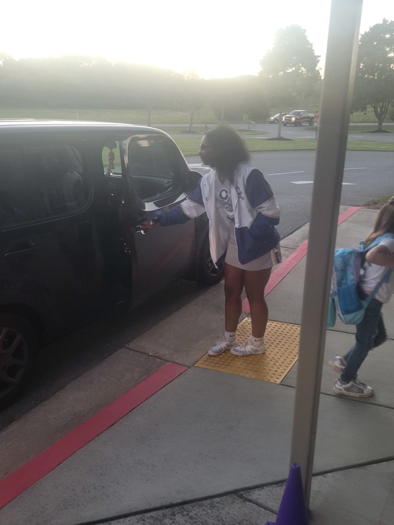 We had special guests come help us in the car rider line this morning. We always love when our neighboring Colonels can come support us! #loveblue #livegold 💙💛