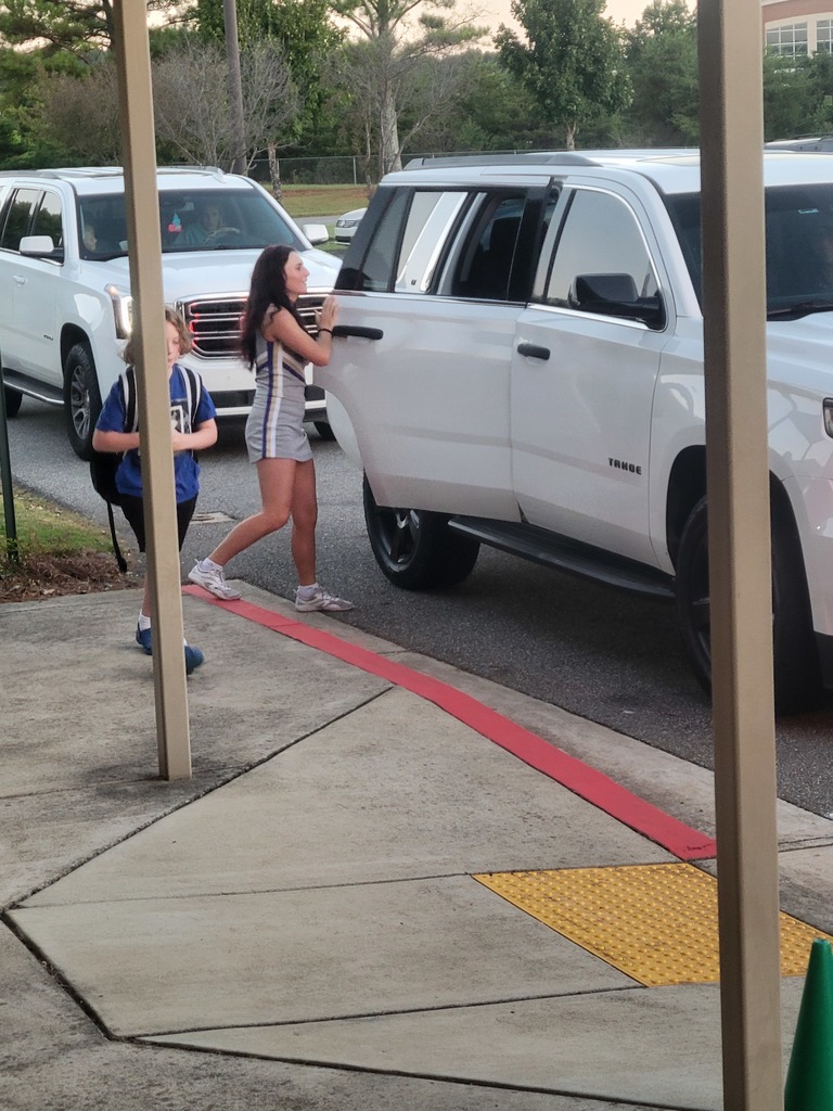 We had special guests come help us in the car rider line this morning. We always love when our neighboring Colonels can come support us! #loveblue #livegold 💙💛