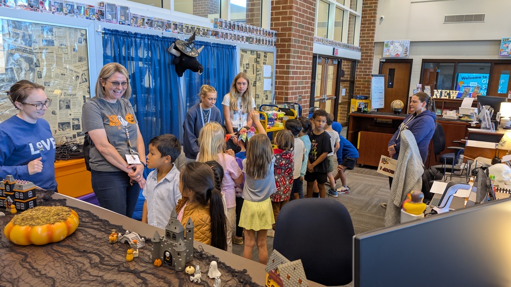 📚✨ Our 1st grade students wrapped up Module One of our new Tier 1 curriculum, Arts and Letters, with a very special “bookend” activity at Cass High School’s Media Center!  Students explored the joy of reading through fun, hands-on stations: 📖 Library & Read Aloud – Listening to The Book With No Pictures by BJ Novak 📚 Book Care – Learning how to take care of books and watching a Colibri machine in action 👥 Book Club – Meeting high school book club members, hearing about their love for reading, and playing “This or That – Reading Edition” 🎨 Bookmarks & Photo Booth – Creating their own bookmarks and taking fun group/solo photos 🖥️ Circulation Desk Tour – Guided by library interns with a special surprise along the way!  To finish the day, our students proudly took the “Reading Warrior” pledge and received a pin and certificate—reminders of the lifelong gift of books and the joy of reading at every age. 💛  We are so proud of our young readers and thankful to Cass High for hosting this memorable experience! 🌟📚