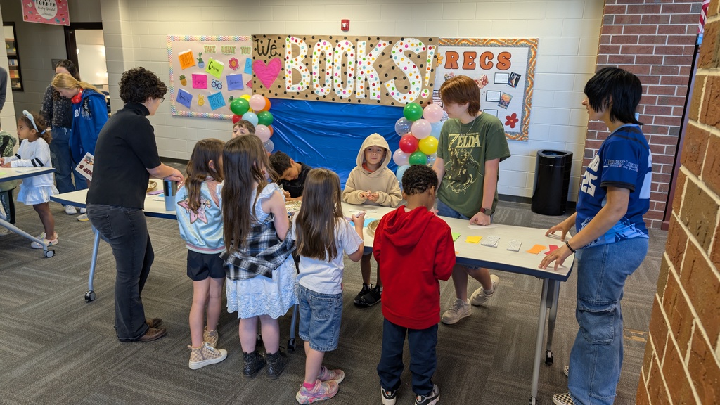 📚✨ Our 1st grade students wrapped up Module One of our new Tier 1 curriculum, Arts and Letters, with a very special “bookend” activity at Cass High School’s Media Center!  Students explored the joy of reading through fun, hands-on stations: 📖 Library & Read Aloud – Listening to The Book With No Pictures by BJ Novak 📚 Book Care – Learning how to take care of books and watching a Colibri machine in action 👥 Book Club – Meeting high school book club members, hearing about their love for reading, and playing “This or That – Reading Edition” 🎨 Bookmarks & Photo Booth – Creating their own bookmarks and taking fun group/solo photos 🖥️ Circulation Desk Tour – Guided by library interns with a special surprise along the way!  To finish the day, our students proudly took the “Reading Warrior” pledge and received a pin and certificate—reminders of the lifelong gift of books and the joy of reading at every age. 💛  We are so proud of our young readers and thankful to Cass High for hosting this memorable experience! 🌟📚