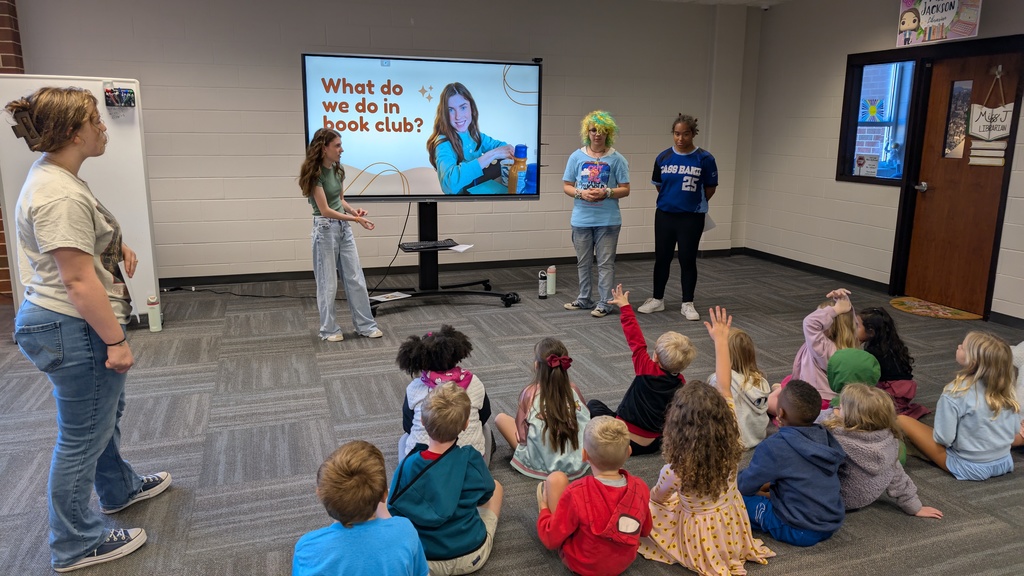 📚✨ Our 1st grade students wrapped up Module One of our new Tier 1 curriculum, Arts and Letters, with a very special “bookend” activity at Cass High School’s Media Center!  Students explored the joy of reading through fun, hands-on stations: 📖 Library & Read Aloud – Listening to The Book With No Pictures by BJ Novak 📚 Book Care – Learning how to take care of books and watching a Colibri machine in action 👥 Book Club – Meeting high school book club members, hearing about their love for reading, and playing “This or That – Reading Edition” 🎨 Bookmarks & Photo Booth – Creating their own bookmarks and taking fun group/solo photos 🖥️ Circulation Desk Tour – Guided by library interns with a special surprise along the way!  To finish the day, our students proudly took the “Reading Warrior” pledge and received a pin and certificate—reminders of the lifelong gift of books and the joy of reading at every age. 💛  We are so proud of our young readers and thankful to Cass High for hosting this memorable experience! 🌟📚