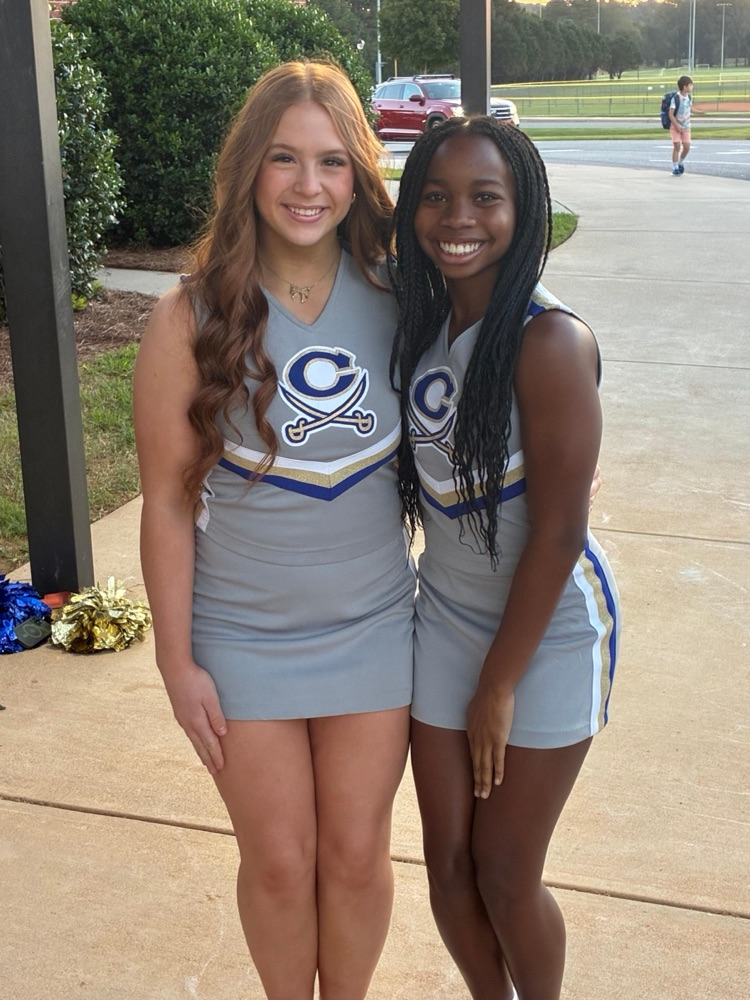 Cass High School cheerleaders helping with car rider line this morning. 