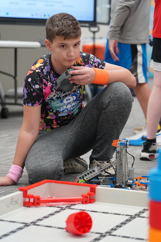 Boy on Robotics team