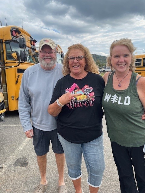 Bus drivers smiling for a picture for Bus Appreciation week.