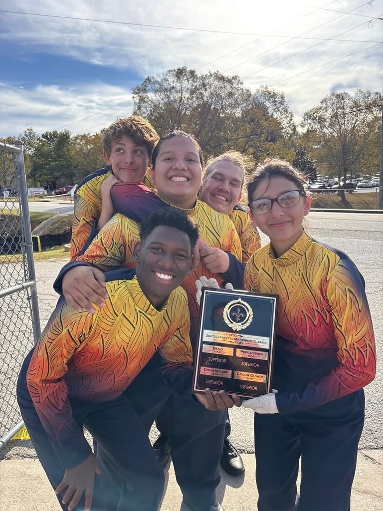 Woodland Band members holding award