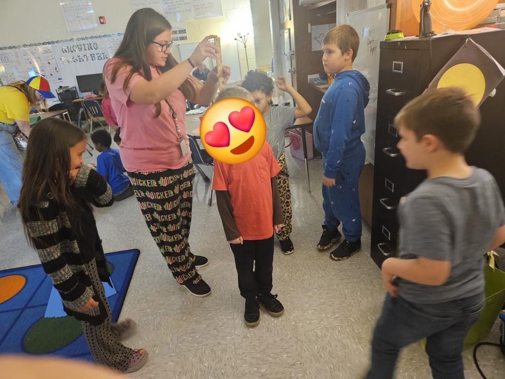 Mrs. Hill's 2nd grade had to "Build a bed" for a friend. They worked in groups on measuring a friend, measuring the paper given to them, and then making the bed the perfect size for their friend. 