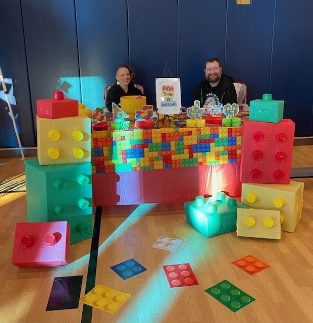 Family smiling for a picture at our trunk or treat.