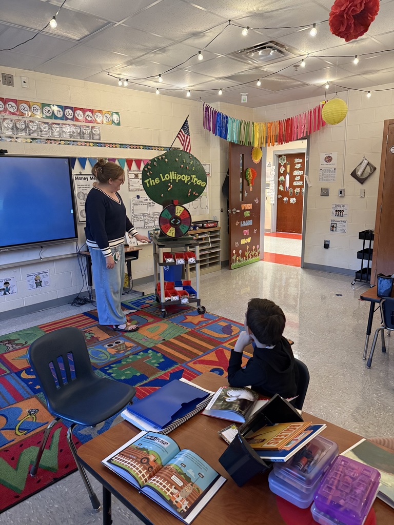 Ms. Payne's class spelled out perfect attendance and got to spin the wheel! They won a lollipop from the lollipop tree! 