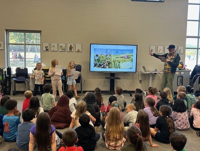 📚✨ Special Visit Alert! ✨📚  Our 1st and 2nd grade students had a wonderful time today with Mr. Shalin, Youth Services Coordinator at Bartow County Public Library! He shared all about the amazing things happening at the library, read some fun stories, and even did some interactive readers theatre! 🎭  A big thank you to Mr. Shalin for bringing the joy of reading and imagination to our school today — we can’t wait to see you again soon for grades 3 - 5! 💛💙