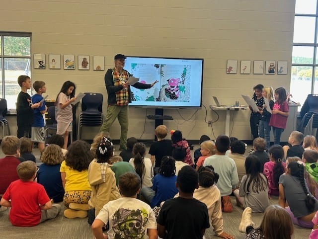 📚✨ Special Visit Alert! ✨📚  Our 1st and 2nd grade students had a wonderful time today with Mr. Shalin, Youth Services Coordinator at Bartow County Public Library! He shared all about the amazing things happening at the library, read some fun stories, and even did some interactive readers theatre! 🎭  A big thank you to Mr. Shalin for bringing the joy of reading and imagination to our school today — we can’t wait to see you again soon for grades 3 - 5! 💛💙