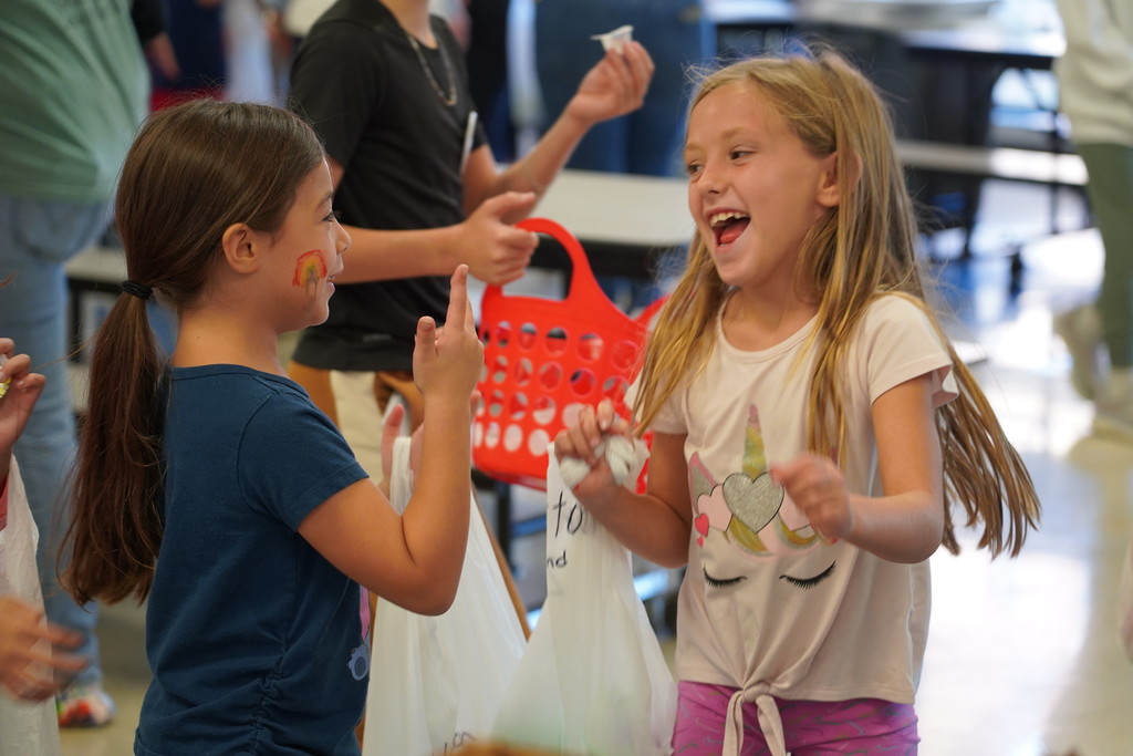 Clear Creek Elementary School student dancing with excitement.