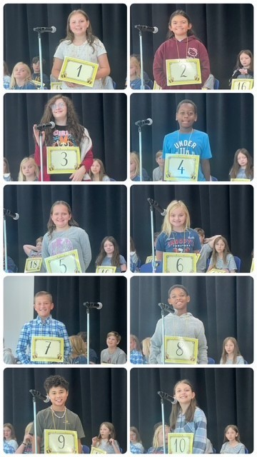 Spelling bee participants smiling for a picture.