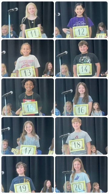 Spelling bee participants smiling for a picture. 