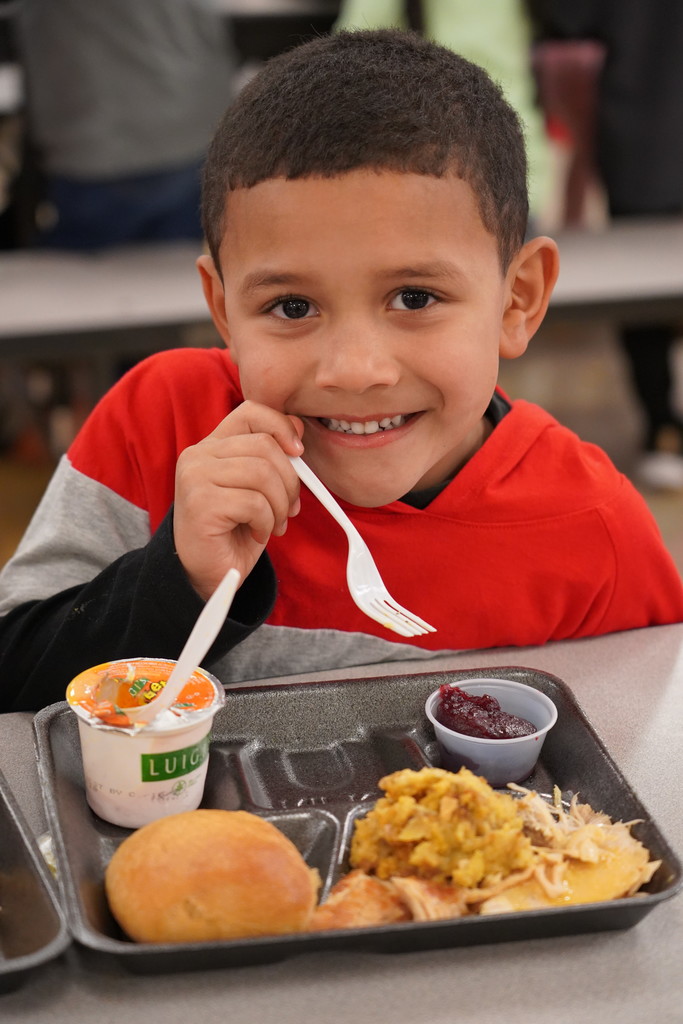 Cloverleaf Elementary student eating a meal in the cafeteria