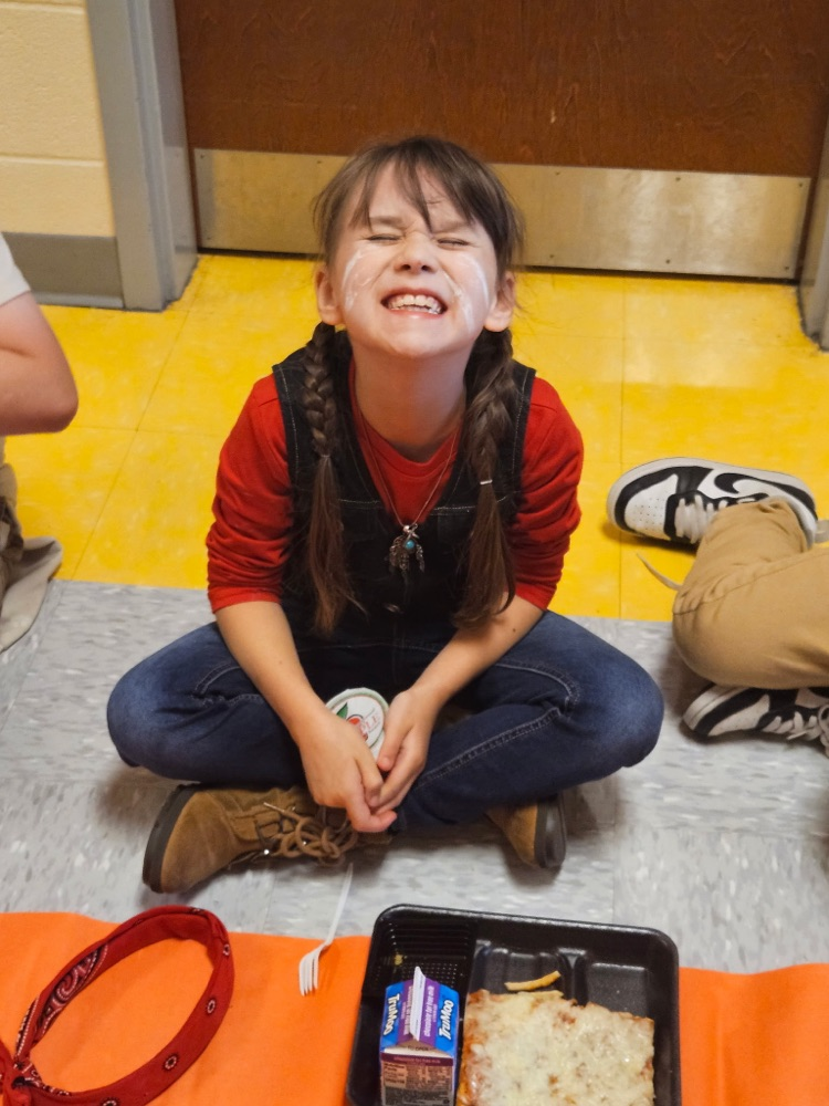 Second grade had a thanksgiving lunch in the hallway. They have been learning about Native Americans and today they got to dress like them and feast like them! 