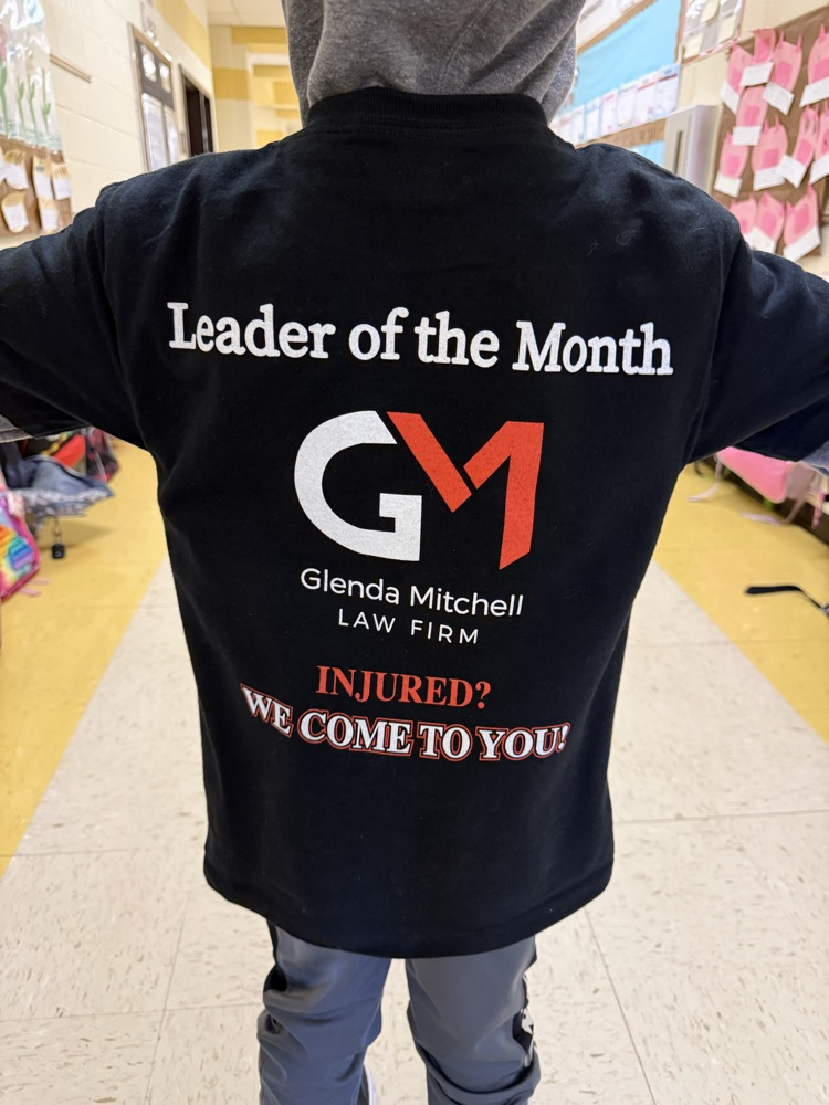 a boy wearing. black shirt