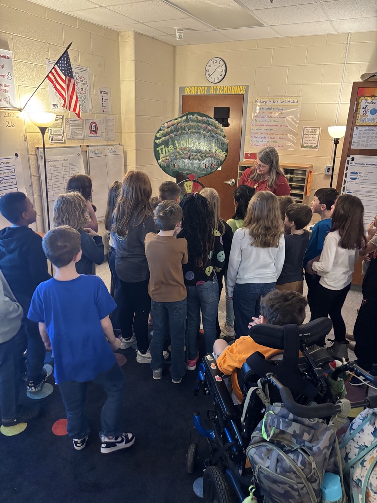 Congratulations to Ms. Lanham's class for spelling perfect attendance! They won lollipops from the lollipop tree! 